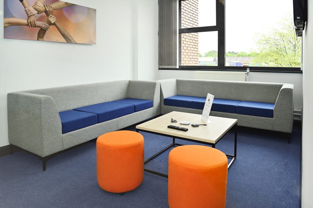 breakout meeting area with sofa's & coffee table